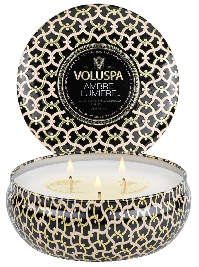 CANDLE.  VOLUSPA TIN AMBER SCENT