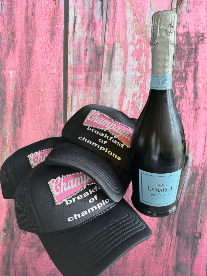 CHAMPAGNE TRUCKER HAT BLACK AND PINK