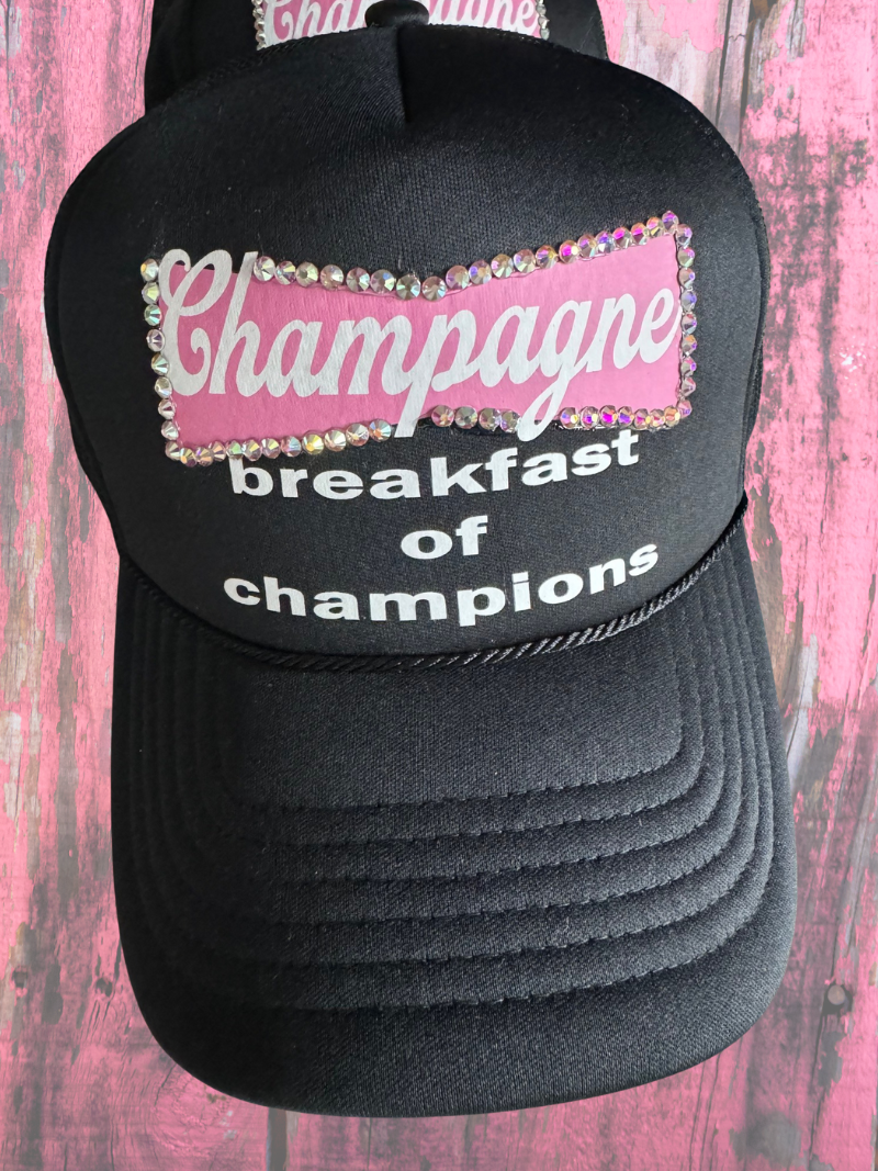 CHAMPAGNE TRUCKER HAT BLACK AND PINK