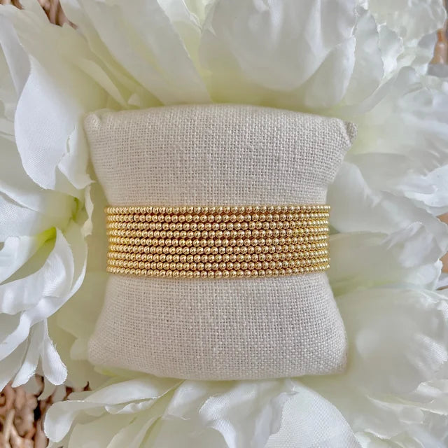 SINGLE STRAND MINI GOLD BEADED BRACELET